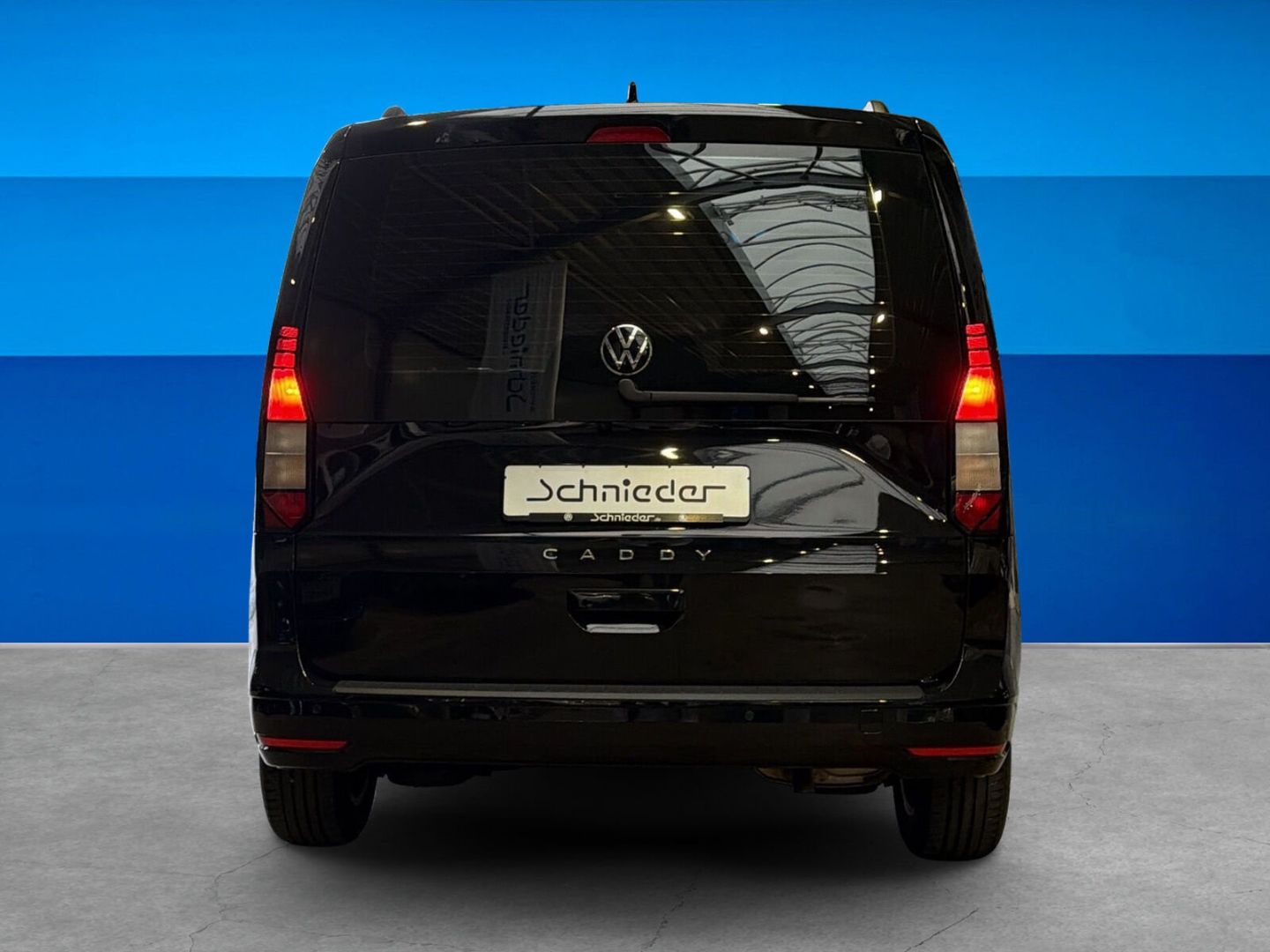 Fahrzeug 9 Fahrzeugabbildung Volkswagen Caddy 1.5 TSI Life Rear View Climatronic - mit KI generiert/bearbeitet