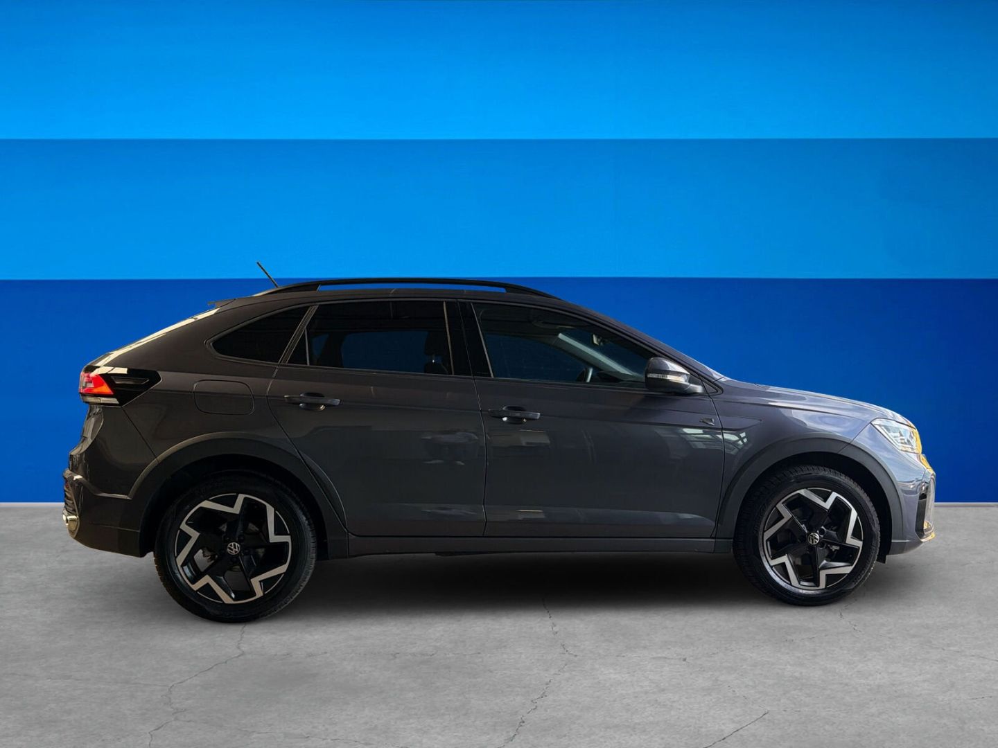Fahrzeug 6 Fahrzeugabbildung Volkswagen Taigo 1.5 TSI R-Line Rear View Navi Clima - mit KI generiert/bearbeitet